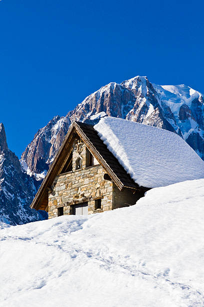 istock Chalet in the snow 166076665