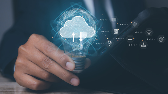 Light Computing Storage Business Hand Using Light Bulb With Cloud Computing Technology Storage ...