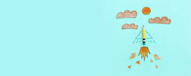 istock Concept image of pencil as rocket metaphor on blue background 1660778712