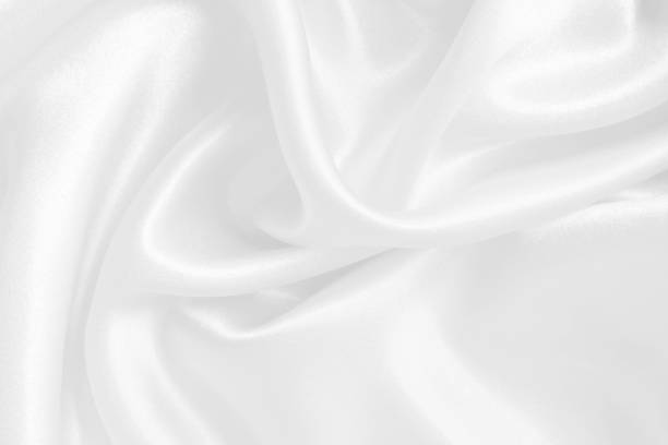 istock White fabric texture for background and design, beautiful pattern of silk or linen. 1660779878