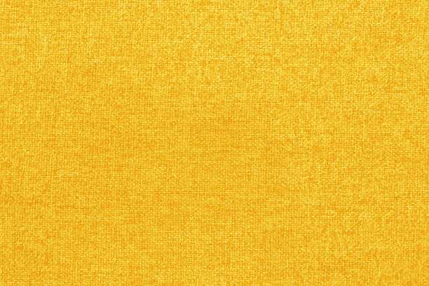istock Yellow fabric cloth texture background, seamless pattern of natural textile. 1660780415