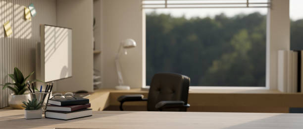 istock Copy space on a hardwood desk in a modern private office or home workspace 1660801497