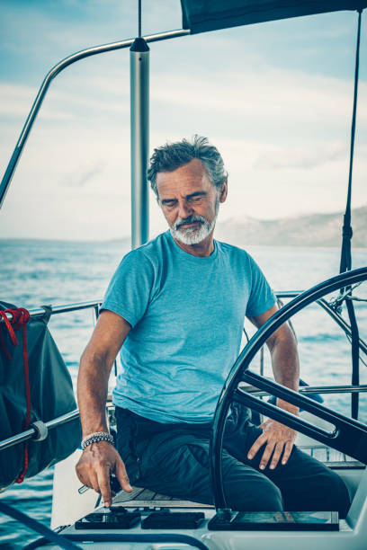 istock Skipper sailing on sailboat 1660807998
