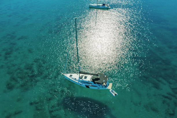 istock Anchored sailboat, view from drone 1660810767