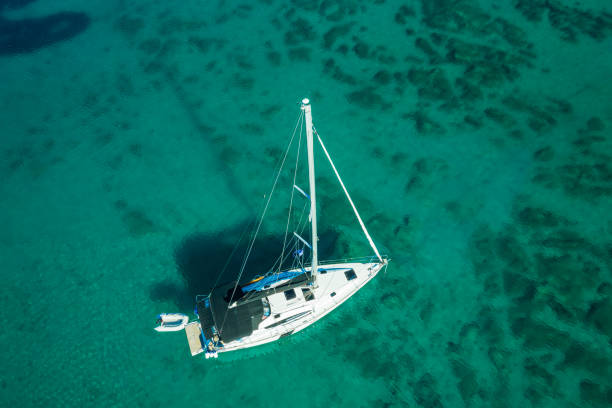 istock Anchored sailboat, view from drone 1660811167