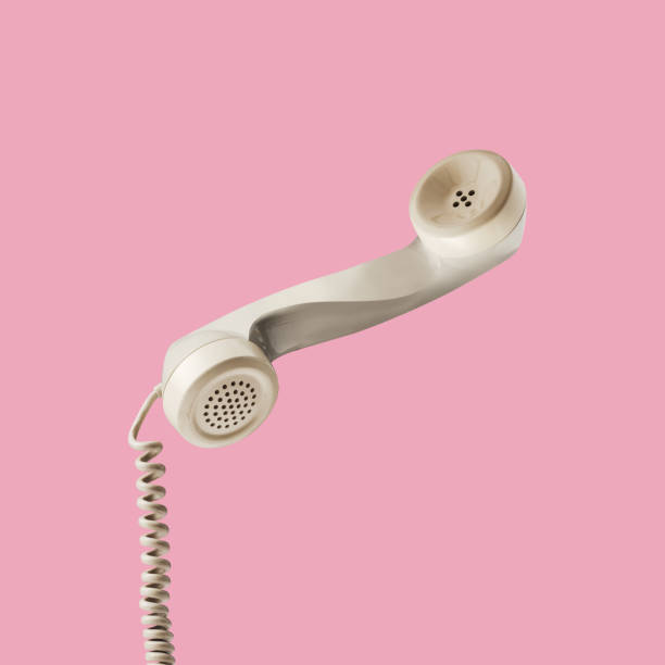 istock Twisted vintage telephone receiver isolated 1660811691