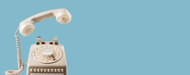istock Vintage rotary dial phone banner 1660818086