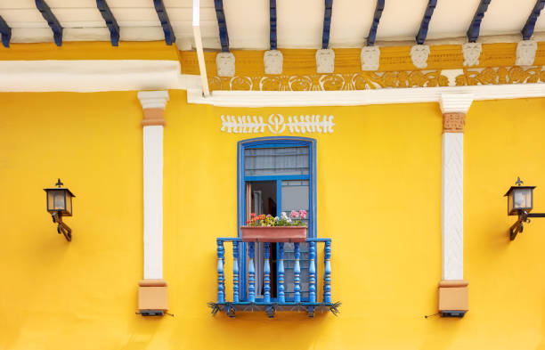 Street view of the old facade of a colonial building, Cuenca, Ecuador. stock photo