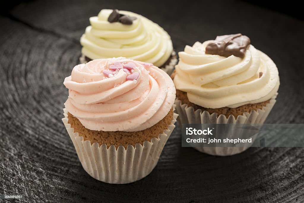 Três Cupcakes - Foto de stock de Bolinho royalty-free
