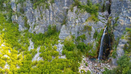 Aerial drone view of Grunas Waterfall in Theth National Park, Albania. Albanian Alps