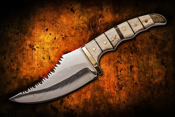 hand crafted hunting knife used to skin an animal