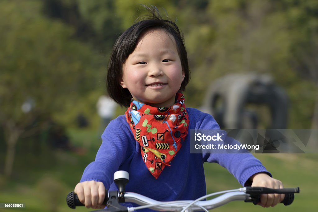 Asian girl, riding bicycle Asian girl Mimi, riding bicycle Bicycle Stock Photo