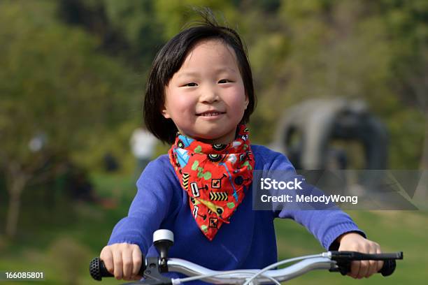 Asian Girl Riding Bicycle Stock Photo - Download Image Now - Bicycle, Black Eye, Black Hair