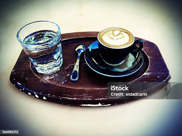 Lomo Cappuccino And Sparkling Water On A Tray Stock Photo - Download Image Now - Alcohol - Drink, Auto Post Production Filter, Cappuccino