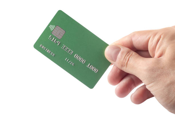 istock Male hand with credit card on white background 1660913024