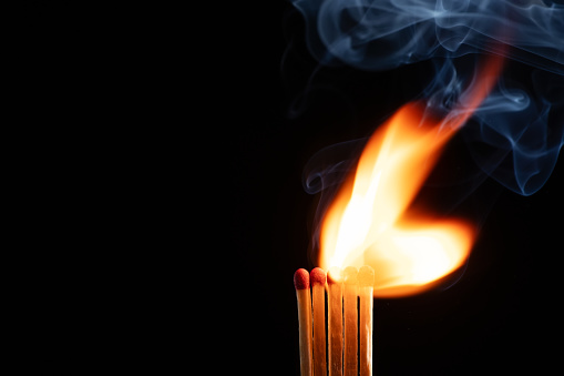 Incense sticks burning in Buddhist Temple