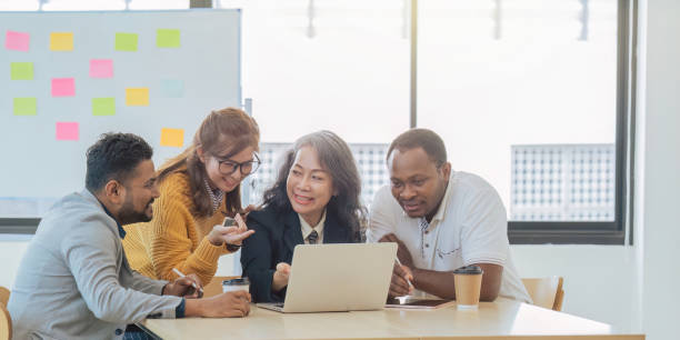 istock Diverse businesspeople gathered in the office having fun during brainstorming while discussing new ideas for their new project 1660914374