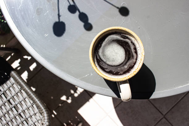 Morning coffee on a sunny day balcony