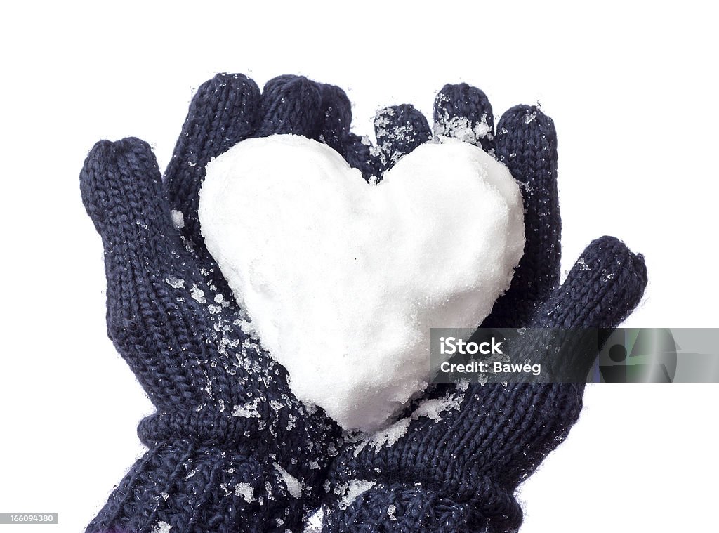 Lady's glove and snow heart Lady's glove and snow heart (isolated). Heart Shape Stock Photo