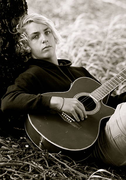 istock young adult and his guitar 166095180