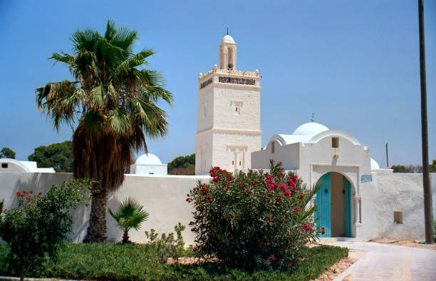 istock view of the palm tree and the mosque 1660953188