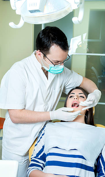 girl at the dentist stock photo