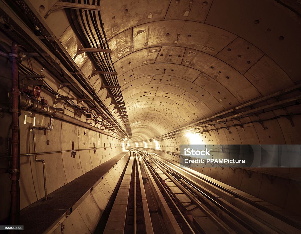 Subway Tunnel Looking down a subway tunnel. Tunnel Stock Photo