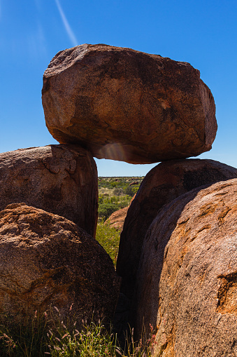The Devil's Marbles are unusual rock formations in Australia's Outback. They're important to Aboriginal culture and look great in photos. People visit for their unique shapes and to experience the desert environment.