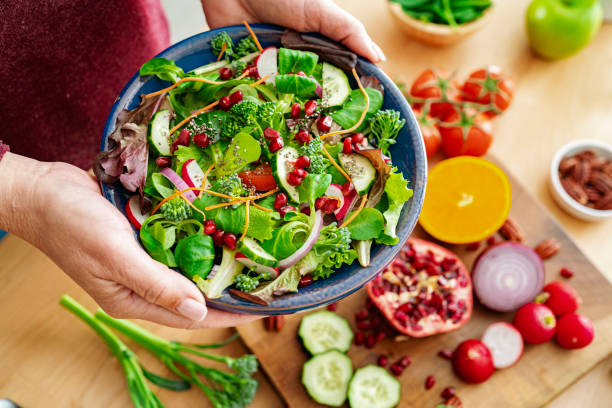 istock Healthy fresh green salad plate 1661012817