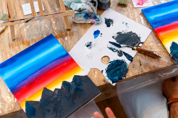 istock Painting Workshop. School Chums Expressing with Brushes and Bottles 1661022414