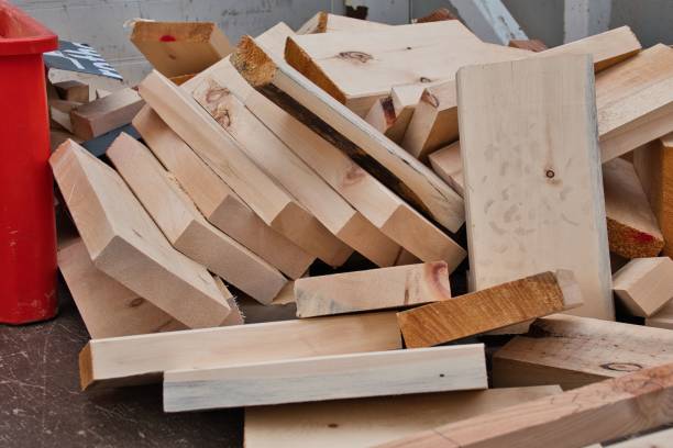 istock Array of wooden planks ready to be recycled into pallets for industrial use 1661022720
