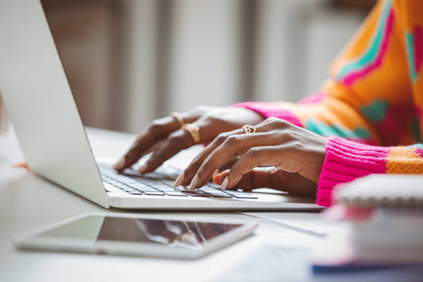 istock Woman typing on laptop keyboard 1661022941