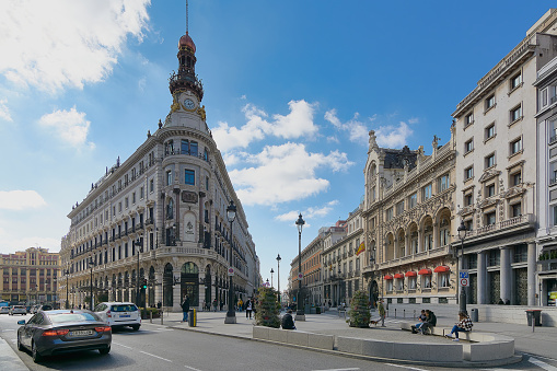 Madrid, Spain - September 5, 2023: Four Seasons Hotel in the city of Madrid in Spain with its characteristic clock on the dome.