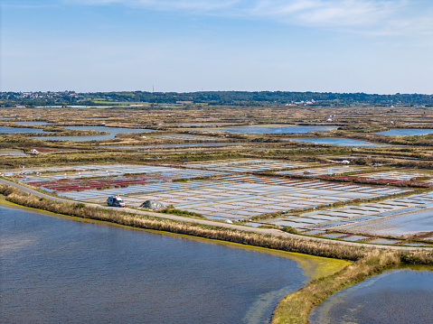 This aerial drone photo shows the Guerande salt marshes. The large fields will be filled with sea water and after a while the salt will be left and sold.