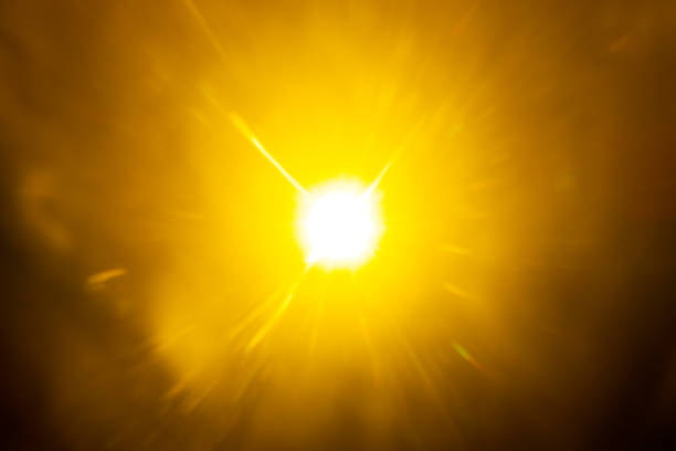 Blurred image Sun flare on the black background