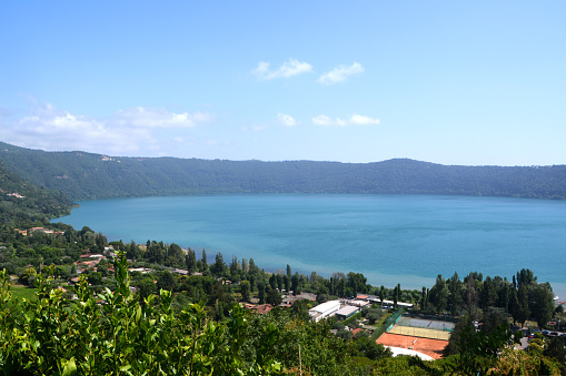 View of lake Albano, a small volcanic crater lake in the Alban Hills of Lazio, at the foot of Monte Cavo.