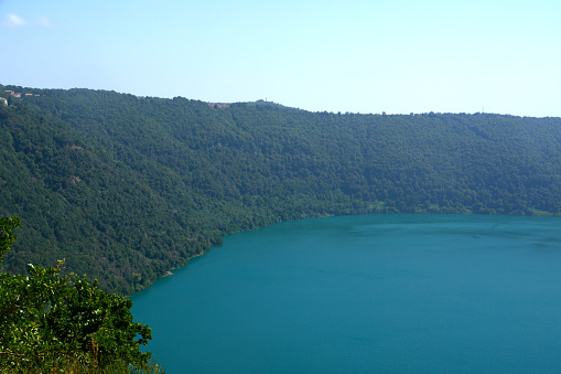 View of lake Albano, a small volcanic crater lake in the Alban Hills of Lazio, at the foot of Monte Cavo.