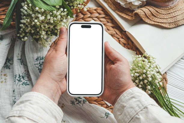 istock Phone with isolated screen, place for your congratulations, spring decor 1661124540
