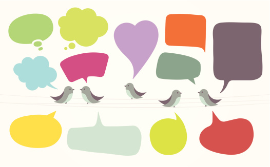 Birds with speech bubbles on wire.