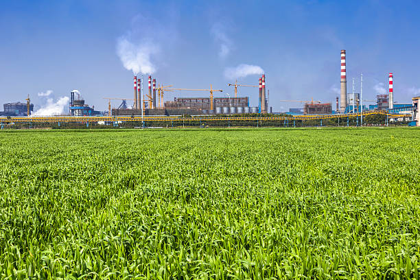 industrial zone - factory green industry landscape stock-fotos und bilder