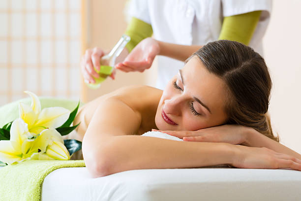 istock woman having a wellness back massage 166114407