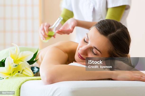 Woman Having A Wellness Back Massage Stock Photo - Download Image Now - Adult, Alternative Therapy, Animal Body Part