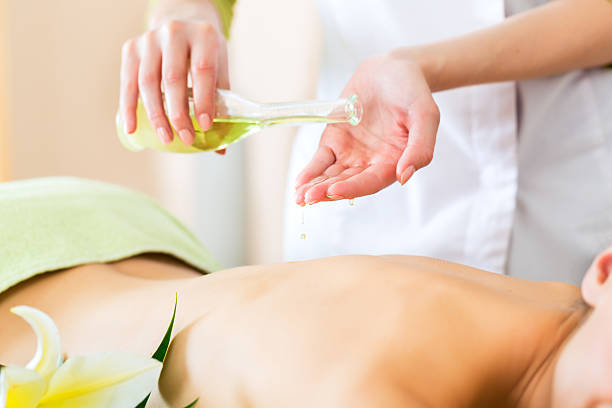 istock woman having a wellness back massage 166114929