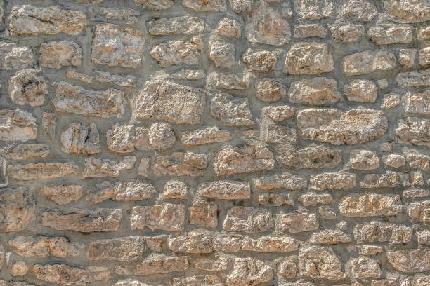 istock Stone texture of an old medieval facade 1661153417