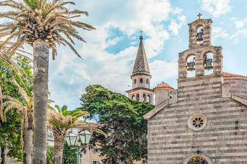 Bell towers of the Holy Trinity Church and The Church of Sveti Ivan or St. John in the Old Town of Budva, Montenegro. Medieval religious architecture of Catholic and Orthodox temples in the Balkans
