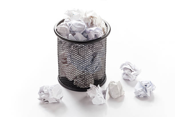 istock Overflowed wastepaper basket 166115360