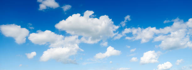 istock The sky with clouds as a backdrop. Sky in the daytime. Panorama in large resolution. White clouds and blue sky. Photo for design and wallpaper. 1661157215