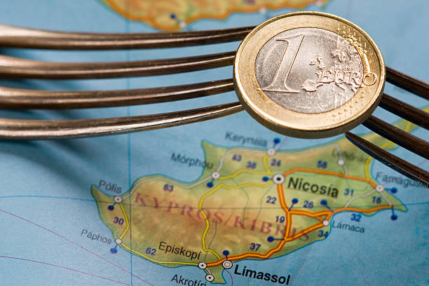 istock Cyprus financial crisis euro coin over map 166116087
