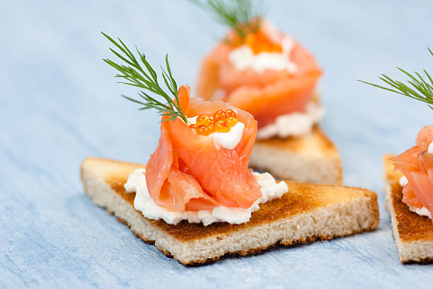 smoked salmon canape stock photo