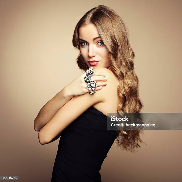 Portrait Of A Long Blonde Haired Woman In A Black Dress Stock Photo - Download Image Now